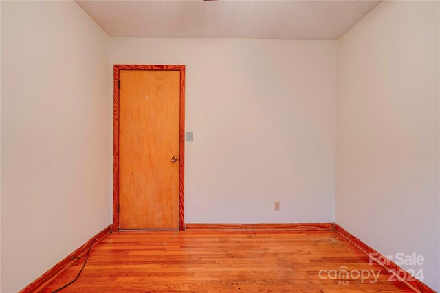 unfurnished room featuring light hardwood / wood-style flooring