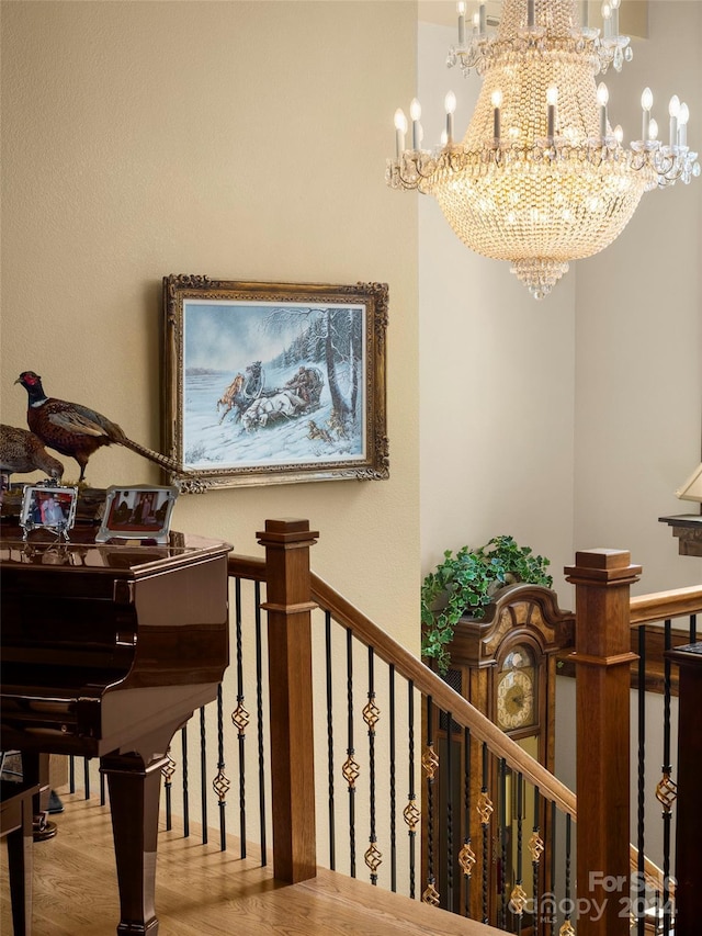 85 Smokey Ridge Trl, Arden, NC 28704 - staircase featuring a chandelier and wood finished floors