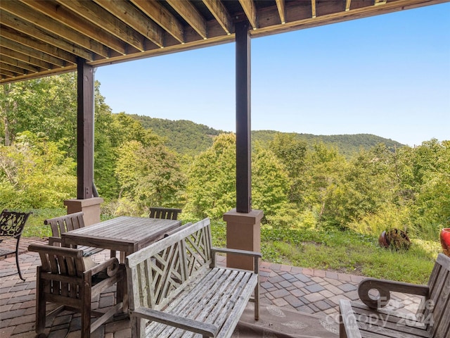 85 Smokey Ridge Trl, Arden, NC 28704 - view of patio with a wooded view and outdoor dining area