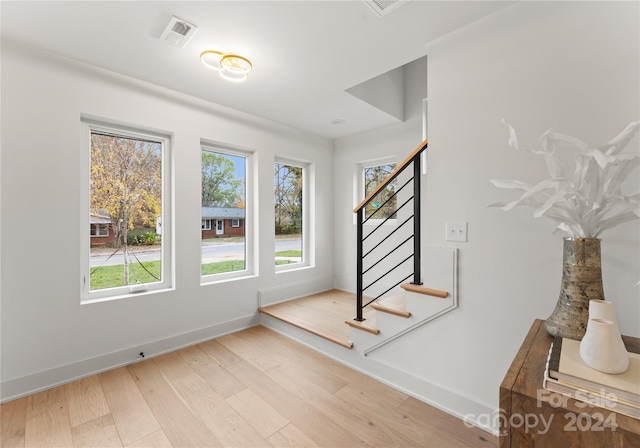 entrance foyer featuring light hardwood / wood-style floors