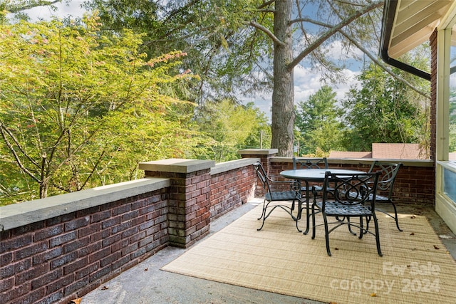 wooden deck with outdoor dining area