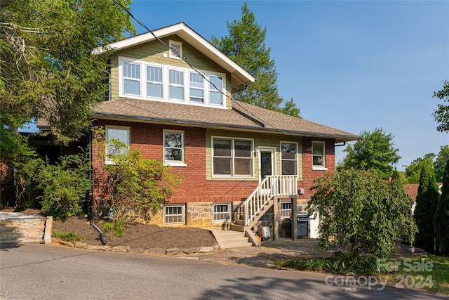 view of front of property with brick siding
