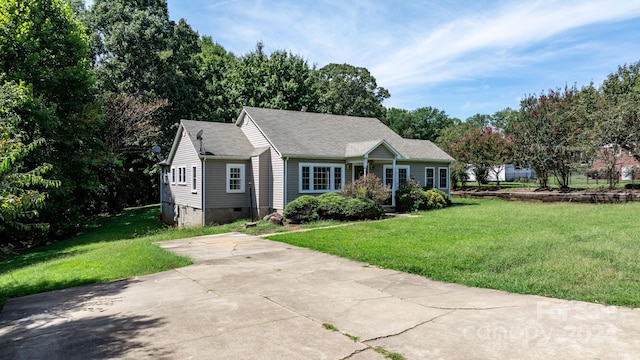 view of front of home with a front yard