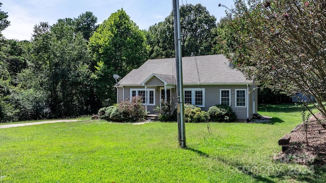 view of front of home with a front yard