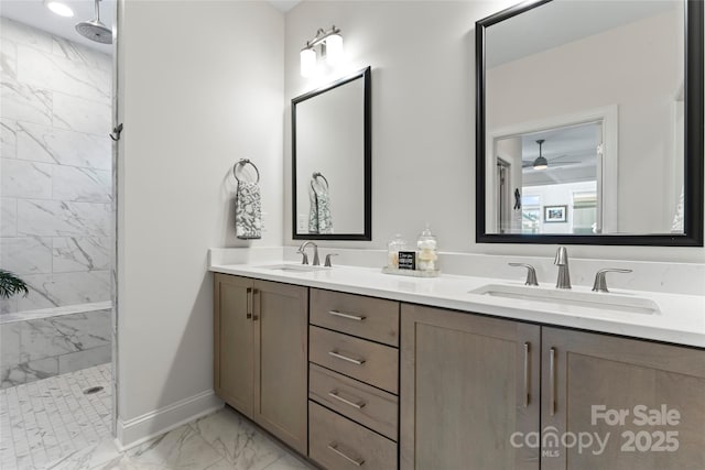 bathroom featuring vanity and tiled shower