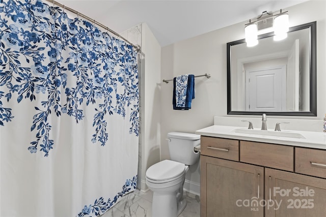 bathroom featuring vanity, a shower with curtain, and toilet