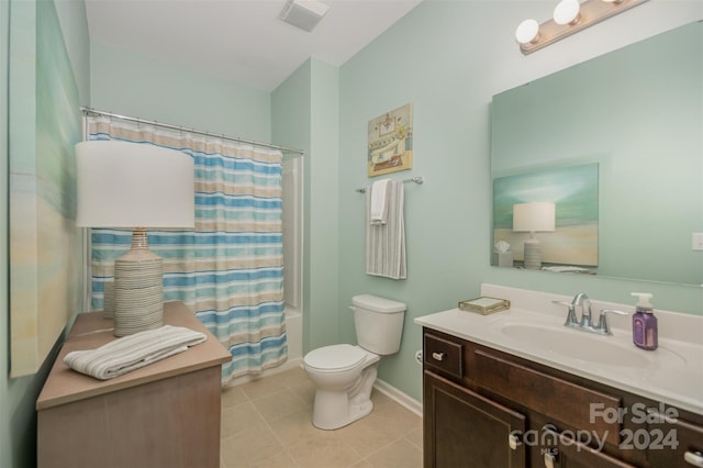 full bathroom featuring tile patterned floors, toilet, shower / tub combo, and vanity