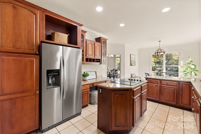 kitchen featuring a kitchen island, black electric cooktop, stainless steel fridge with ice dispenser, pendant lighting, and a chandelier