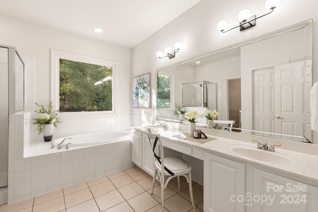 bathroom with vanity, separate shower and tub, and tile patterned floors