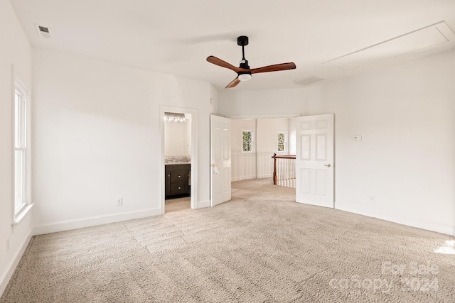 empty room featuring light carpet and ceiling fan