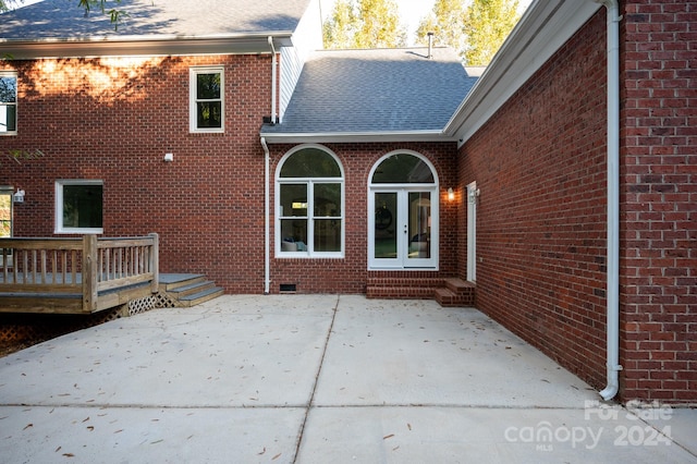 back of house with a patio