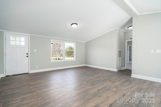 unfurnished living room with dark hardwood / wood-style floors, lofted ceiling with beams, and ornamental molding