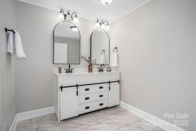 bathroom with vanity and ornamental molding