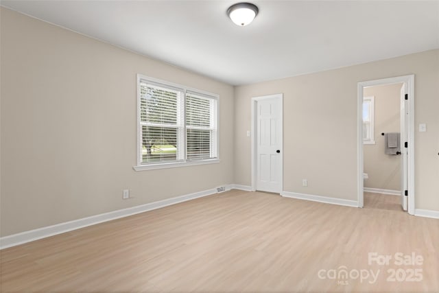 empty room featuring light wood-type flooring