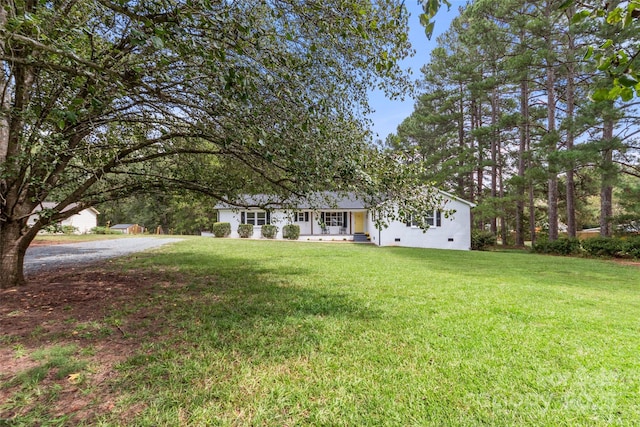 view of front of house with a front lawn