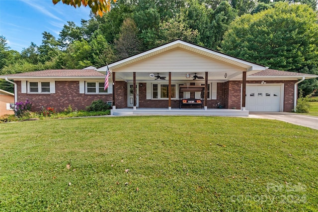 single story home with a garage, a front yard, covered porch, and ceiling fan