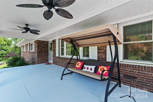 view of patio / terrace featuring ceiling fan