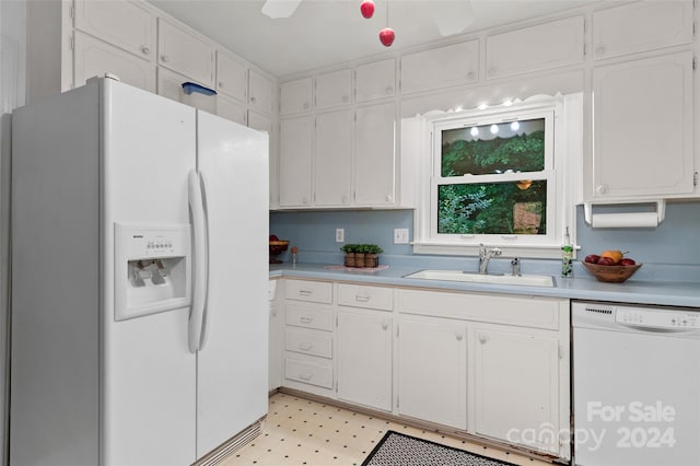 kitchen featuring white cabinets, white appliances, sink, and ceiling fan