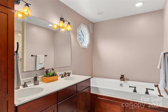 bathroom with a bathing tub and vanity