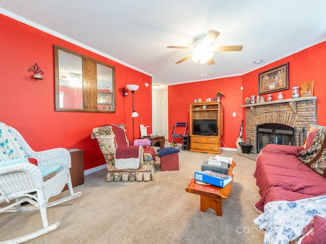 carpeted living room featuring a textured ceiling, ornamental molding, ceiling fan, and a brick fireplace