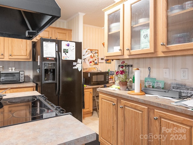 kitchen with black appliances, a textured ceiling, ventilation hood, and crown molding