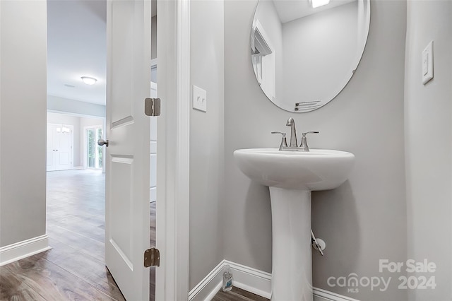 bathroom featuring hardwood / wood-style flooring