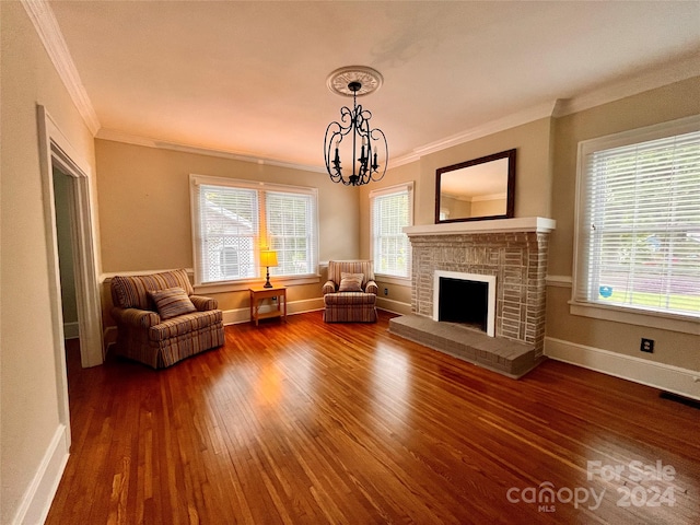 unfurnished living room with dark wood-type flooring, a chandelier, and ornamental molding