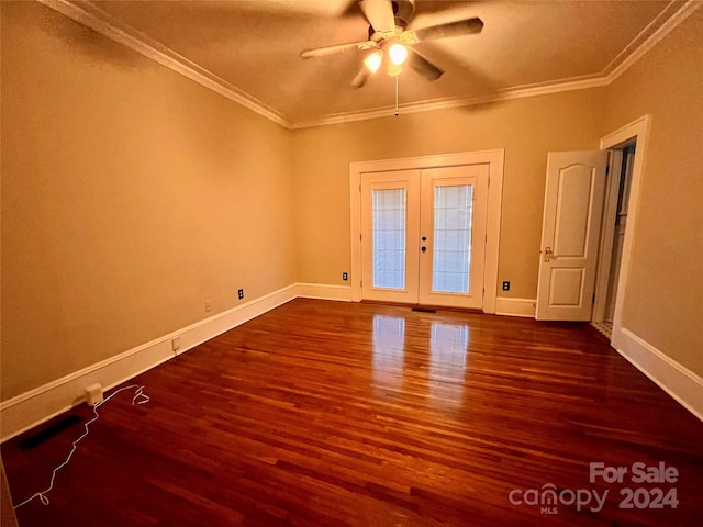 spare room featuring crown molding, ceiling fan, french doors, and hardwood / wood-style flooring