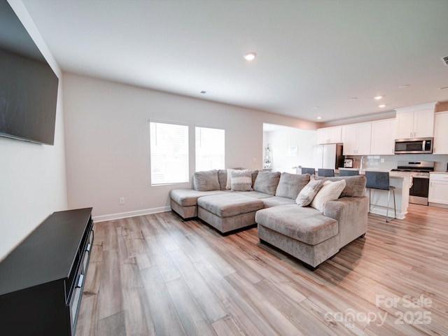 living room featuring light hardwood / wood-style flooring