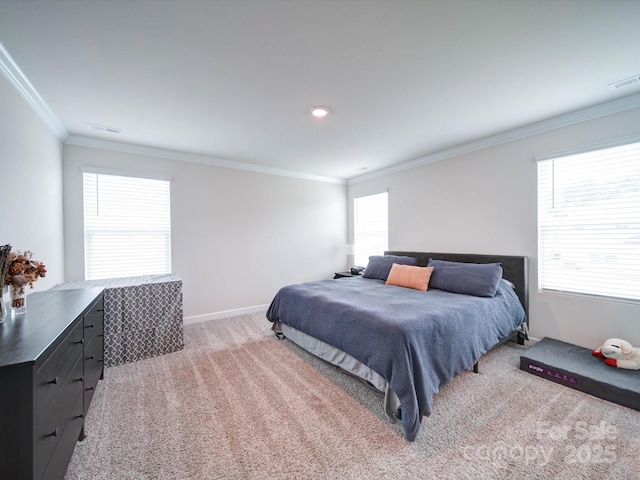 bedroom featuring ornamental molding and light colored carpet