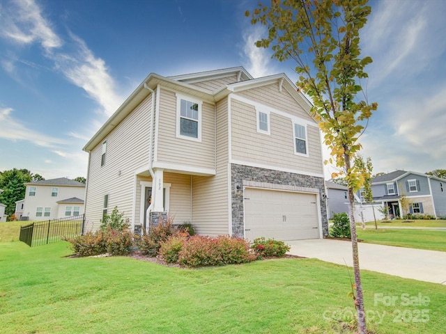 view of front facade with a front yard and a garage