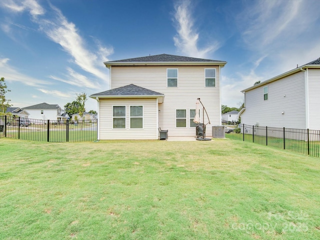 back of house featuring central AC unit, a patio, and a lawn