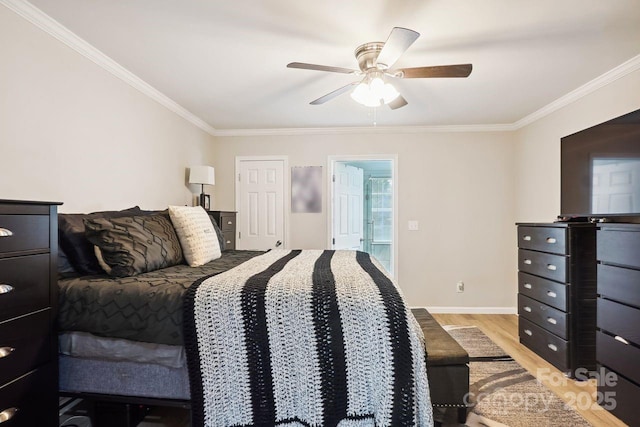 bedroom featuring ornamental molding, ceiling fan, and light hardwood / wood-style flooring