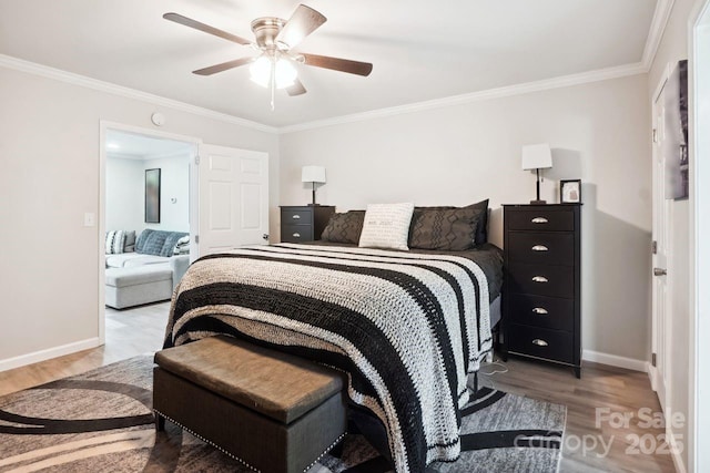 bedroom with wood-type flooring, ceiling fan, and crown molding