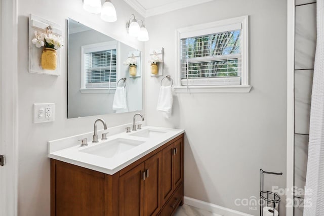 bathroom with vanity and crown molding