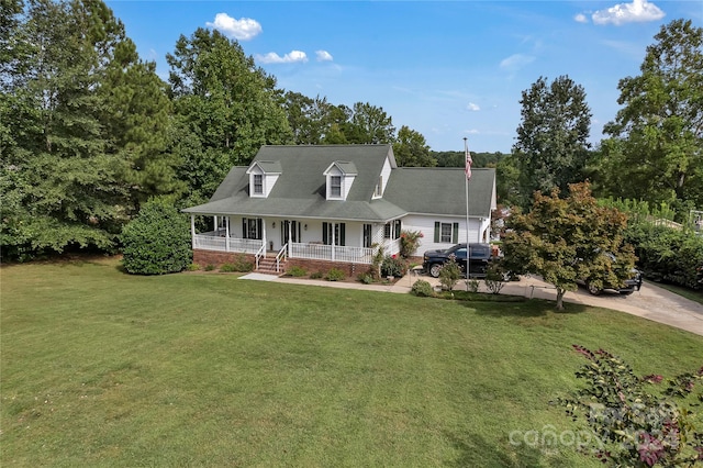 view of front of home featuring a front yard and a porch