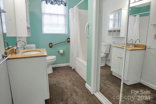 full bathroom featuring vanity, shower / bath combo with shower curtain, and toilet