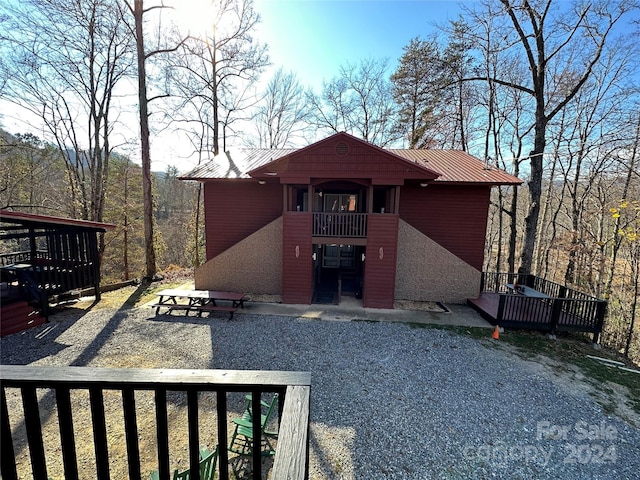 exterior space featuring a balcony