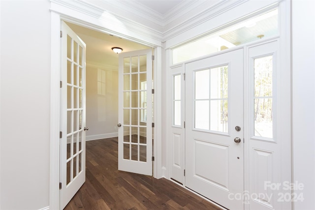 foyer entrance with crown molding, french doors, and dark hardwood / wood-style flooring