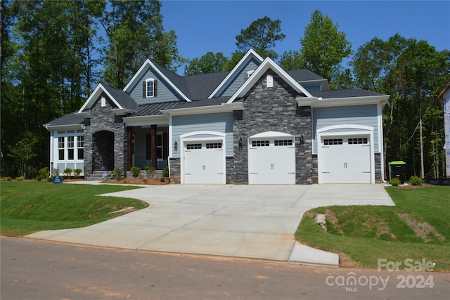 craftsman-style house with a front yard