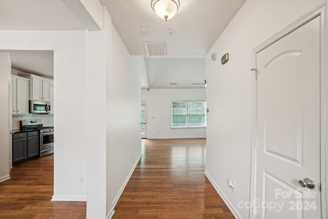 hall featuring dark wood-type flooring