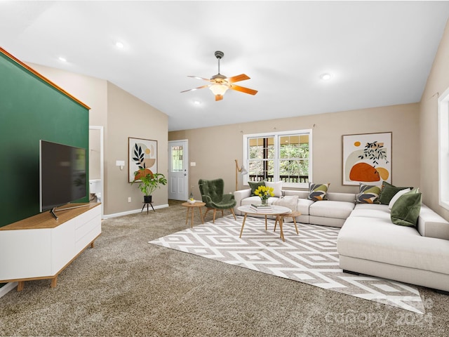 carpeted living room featuring lofted ceiling and ceiling fan