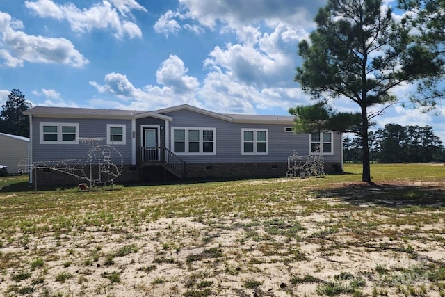 view of front of property with a front lawn