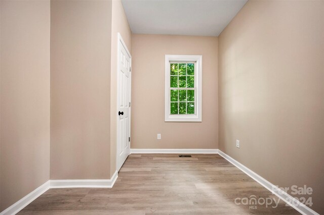 empty room featuring light hardwood / wood-style floors