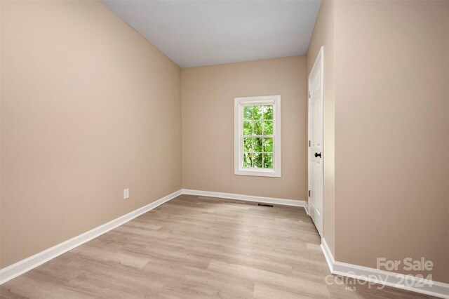 empty room featuring light hardwood / wood-style floors