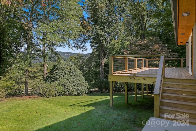 view of yard featuring a deck