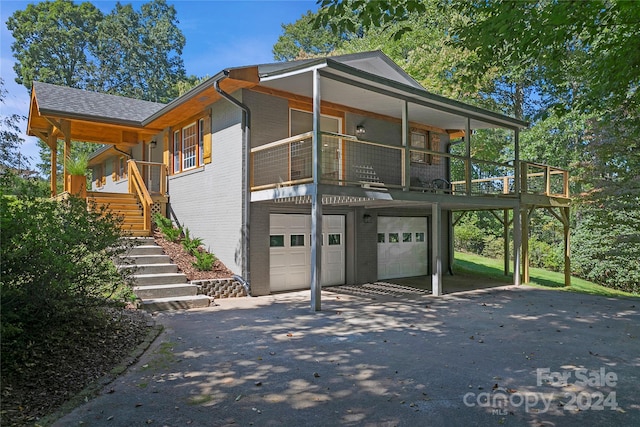 view of front of property featuring a garage