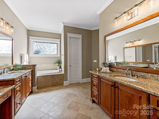 full bathroom with a bath, crown molding, two vanities, and a sink