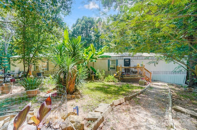 view of yard with a deck