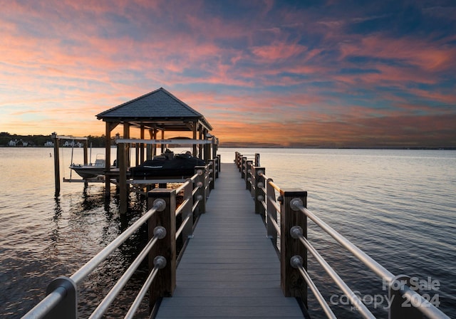dock area featuring a water view